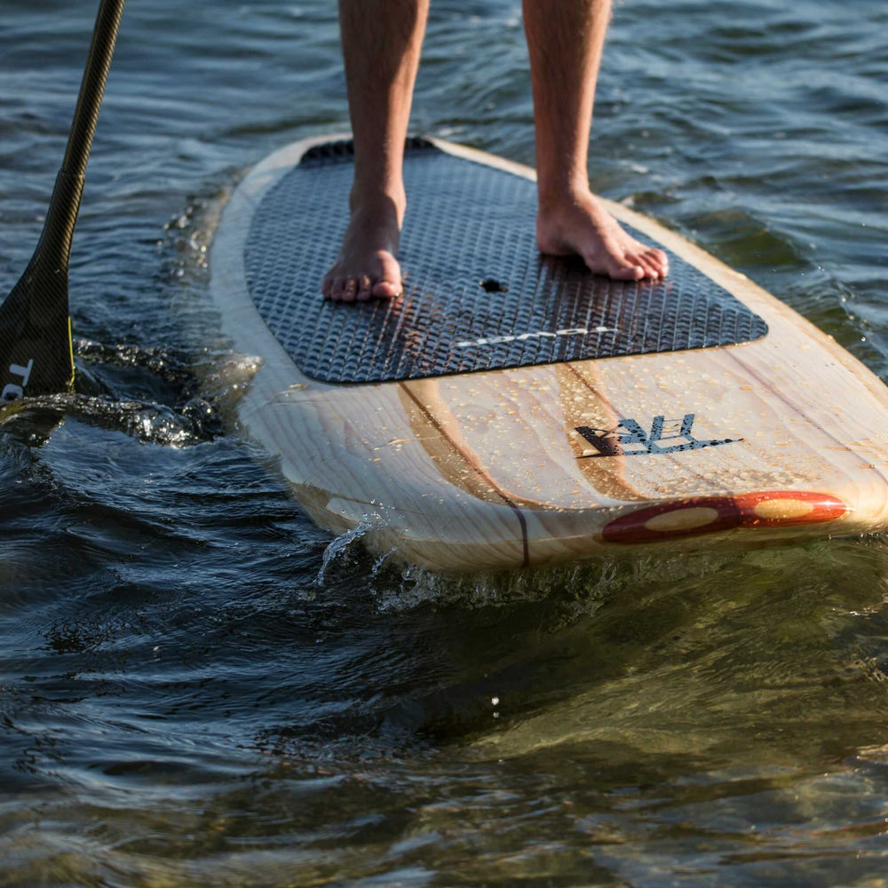 Tower wood paddle board in the water