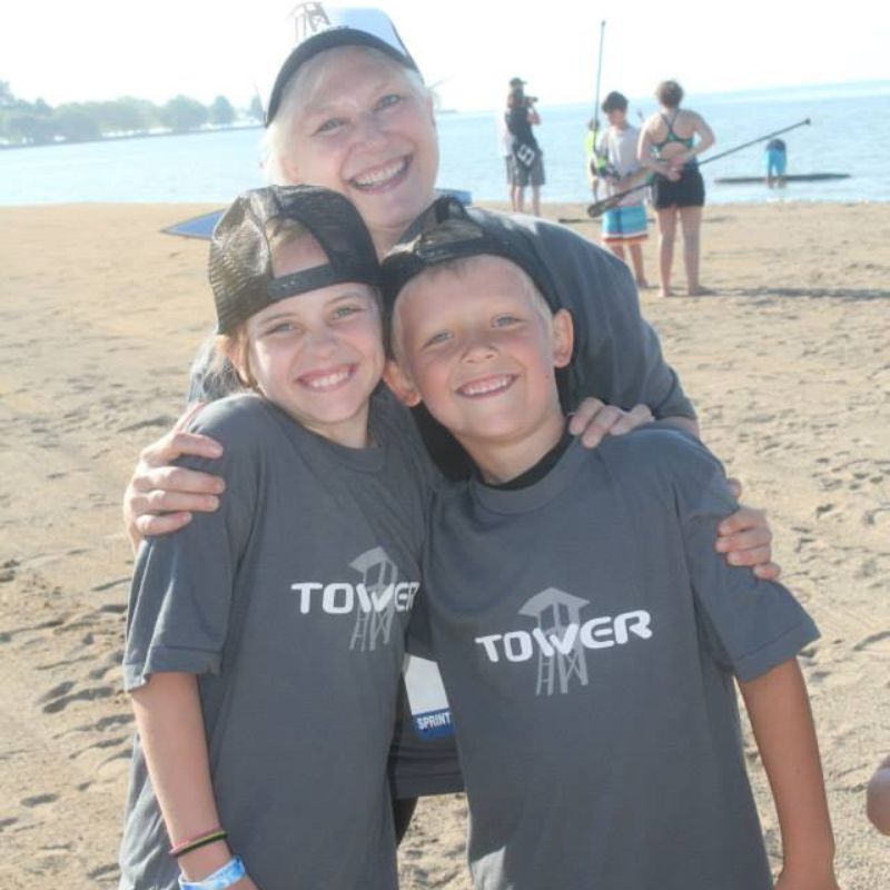 Family wearing Tower paddle board shirts