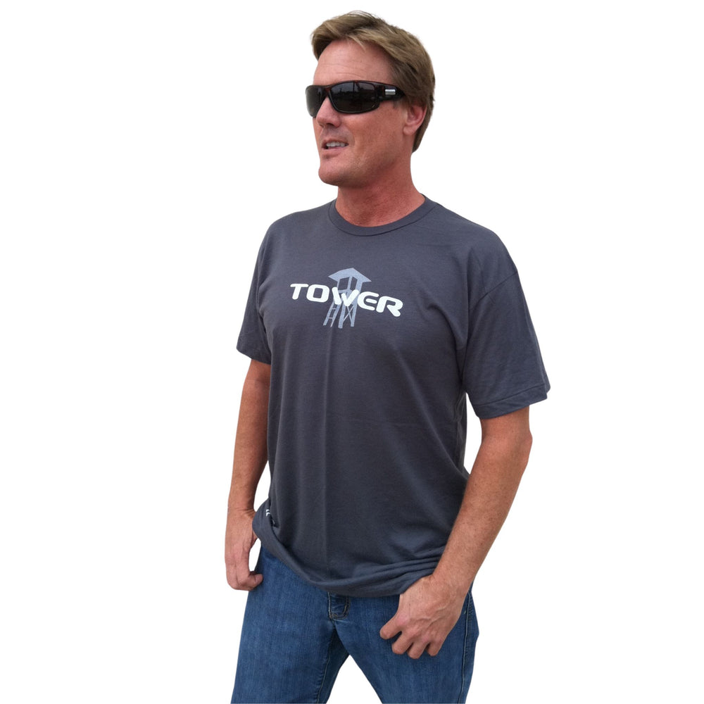 Man in sunglasses wearing a Tower paddle boards shirt