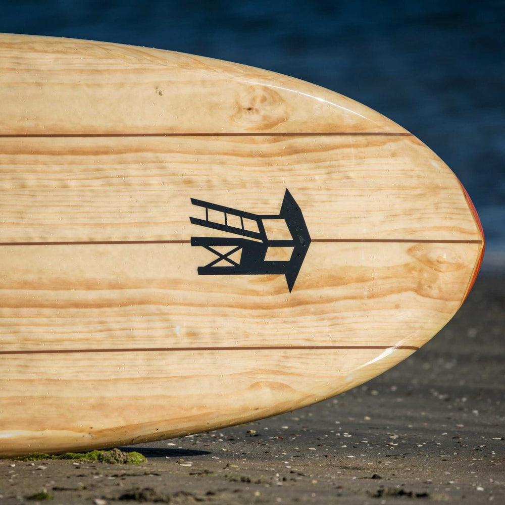 Tower logo on a Tower wood paddle board